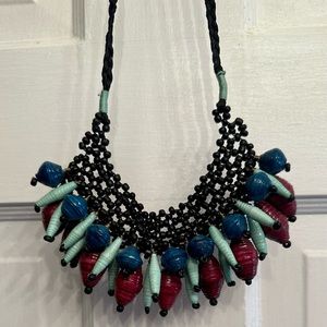 Noonday handmade necklace, ties, color: black, blue, purple